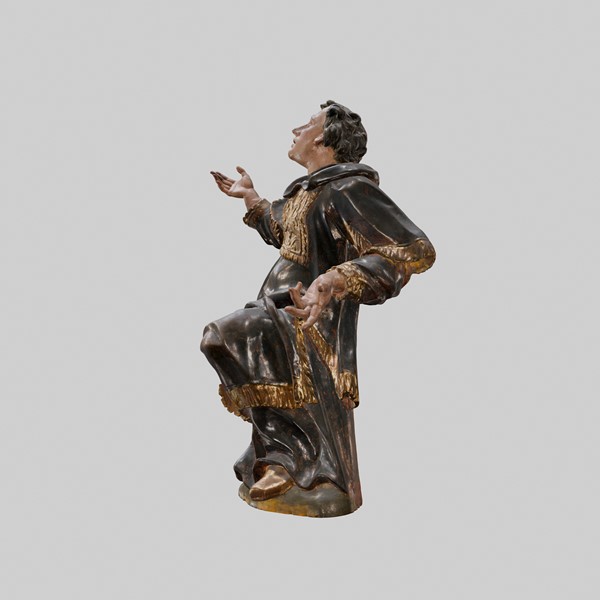 St. Stephen, kneeling